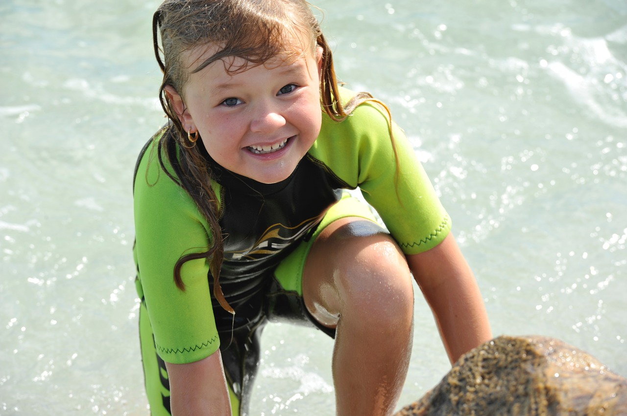 girl swimming ocean free photo