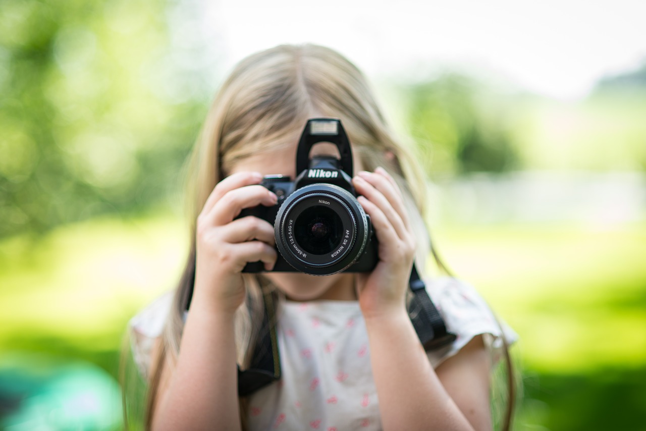 girl taking picture free photo