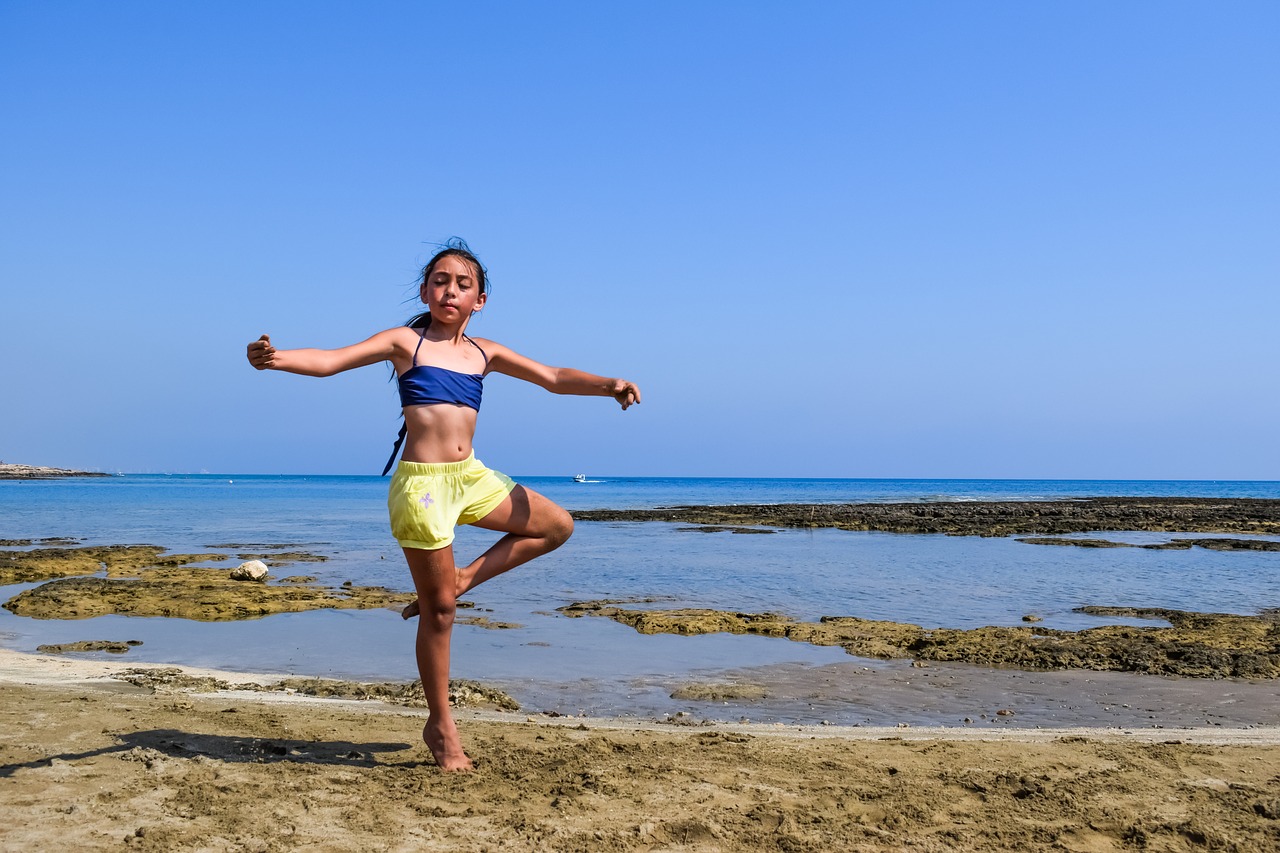 girl dancing beach free photo