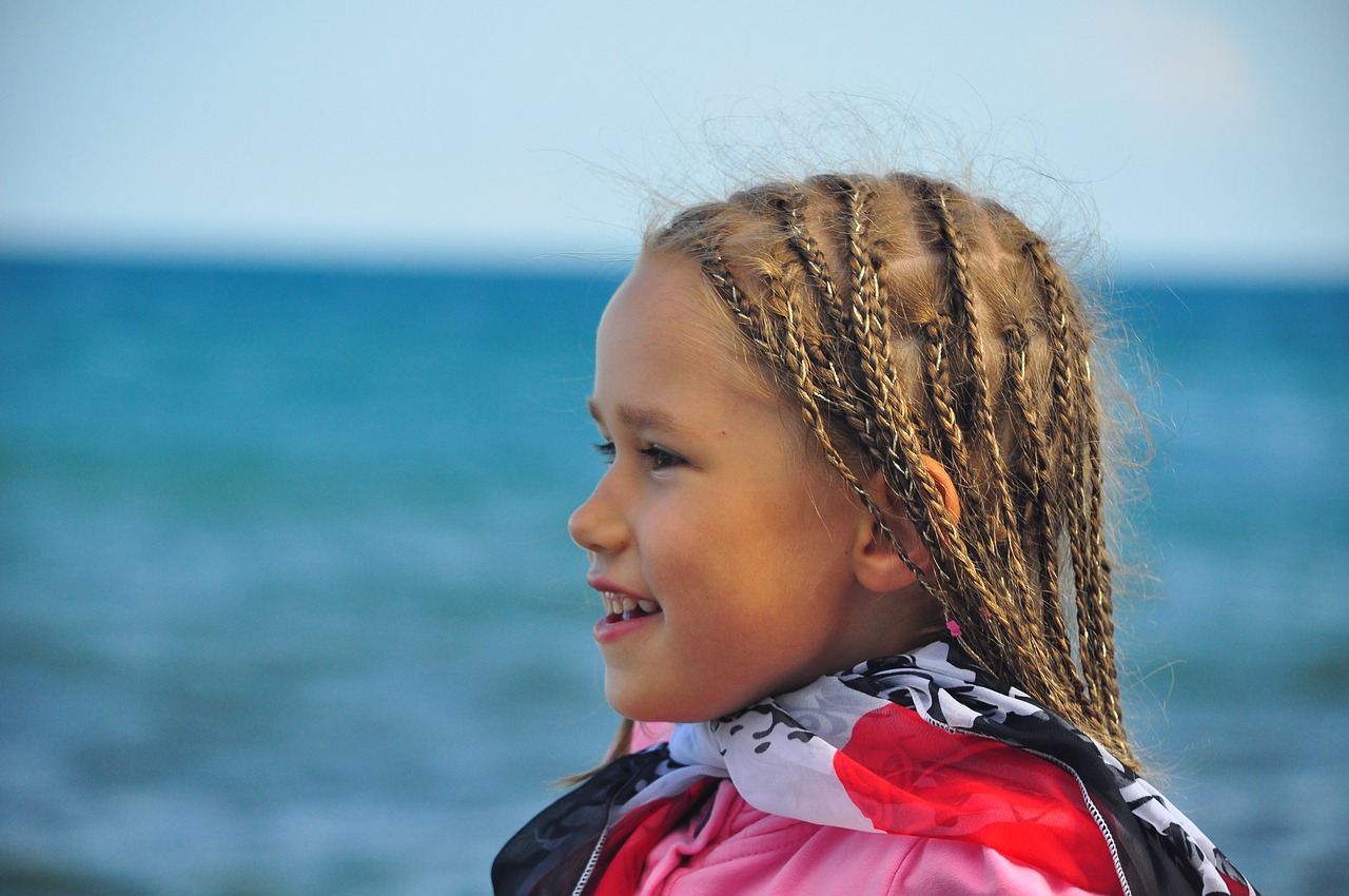 girl pigtails sea free photo