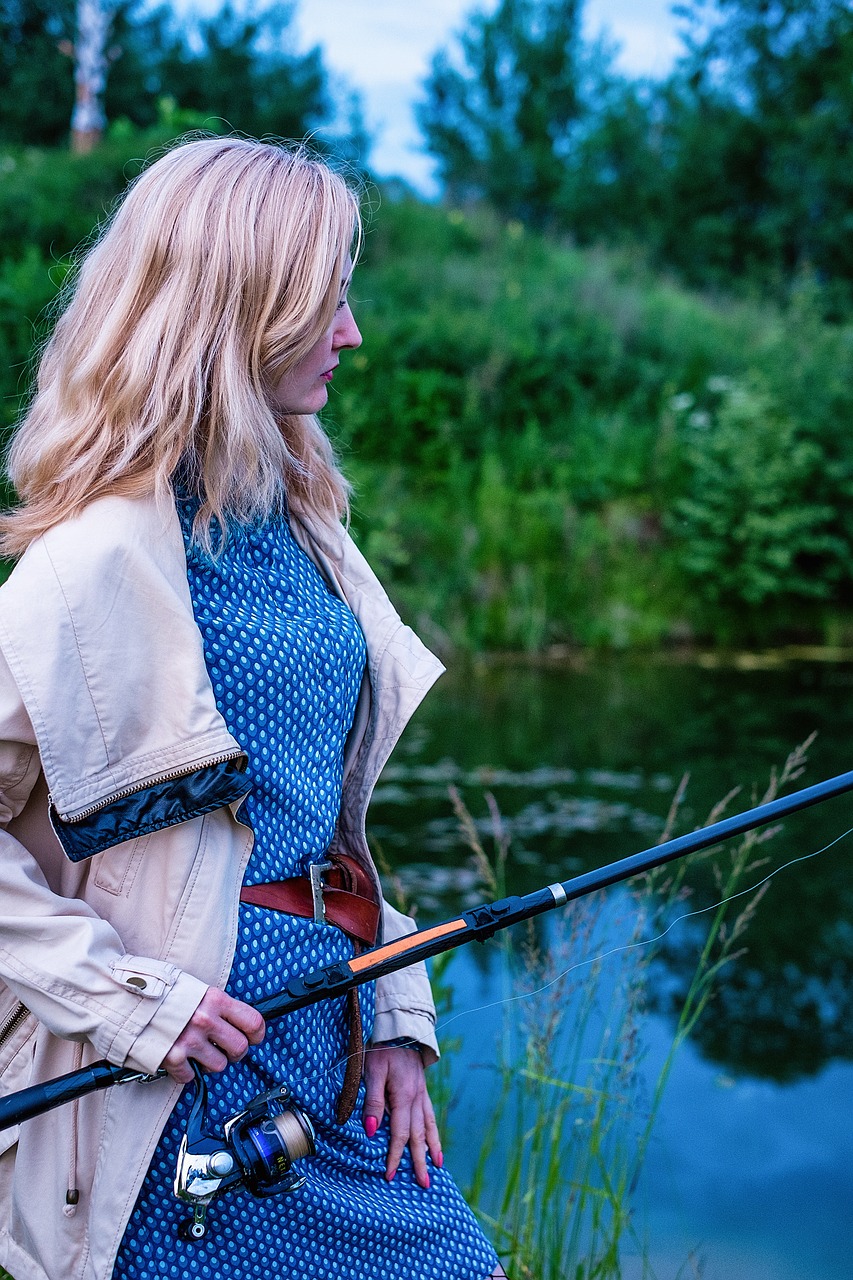 girl fishing rod free photo