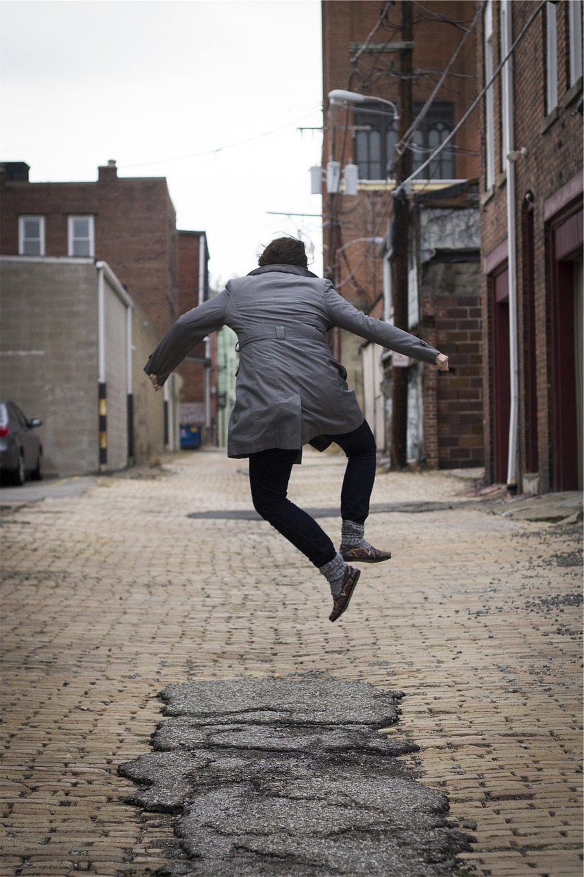 girl jumping happy free photo