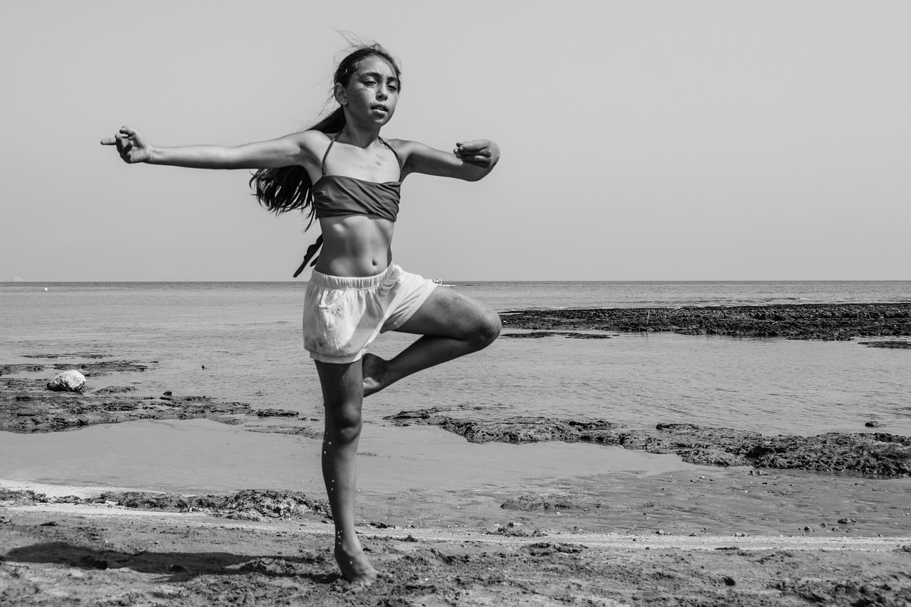 girl dancing beach free photo