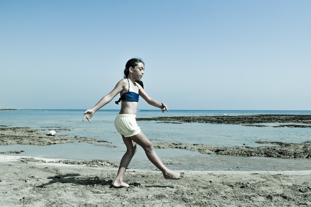 girl dancing beach free photo