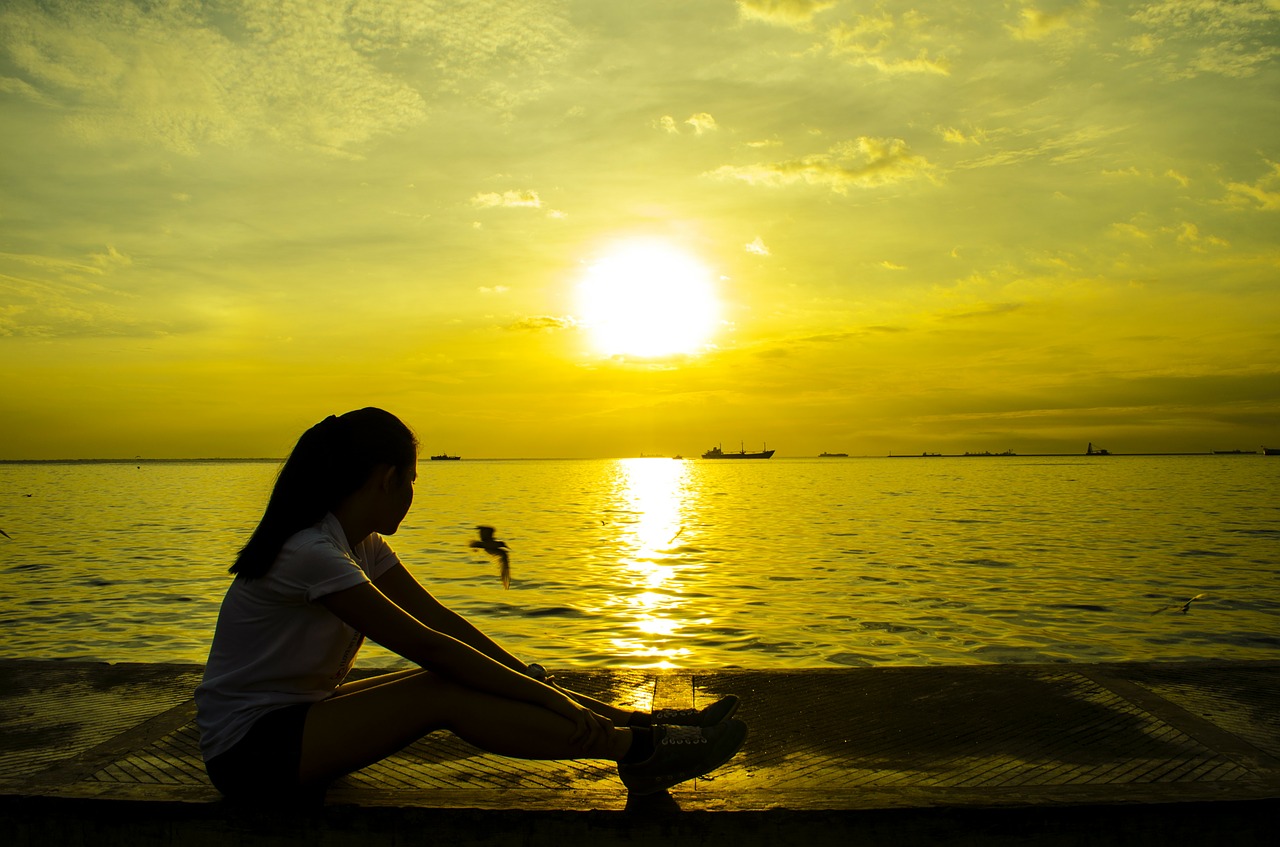 girl sitting sunset free photo