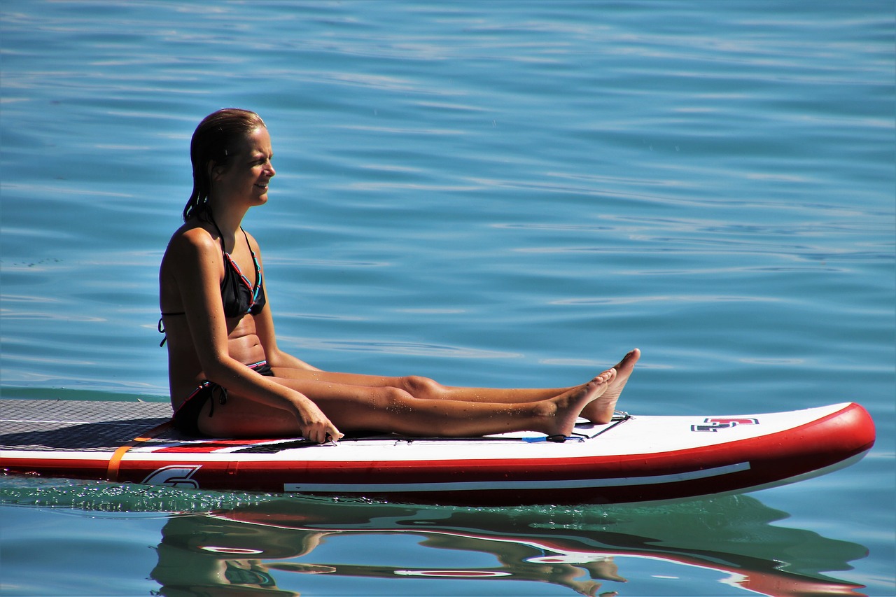 girl  sup  on the water free photo