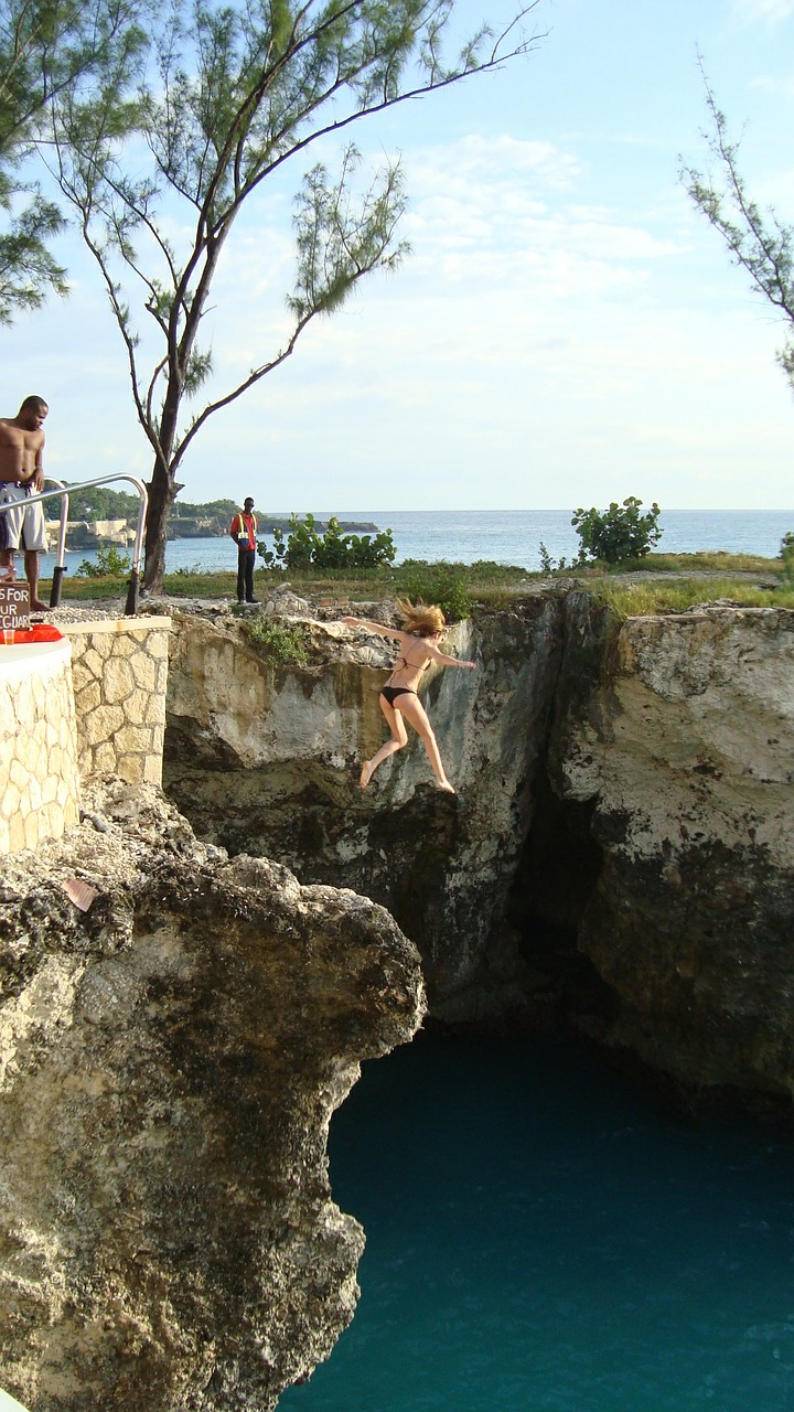 girl jumping water free photo