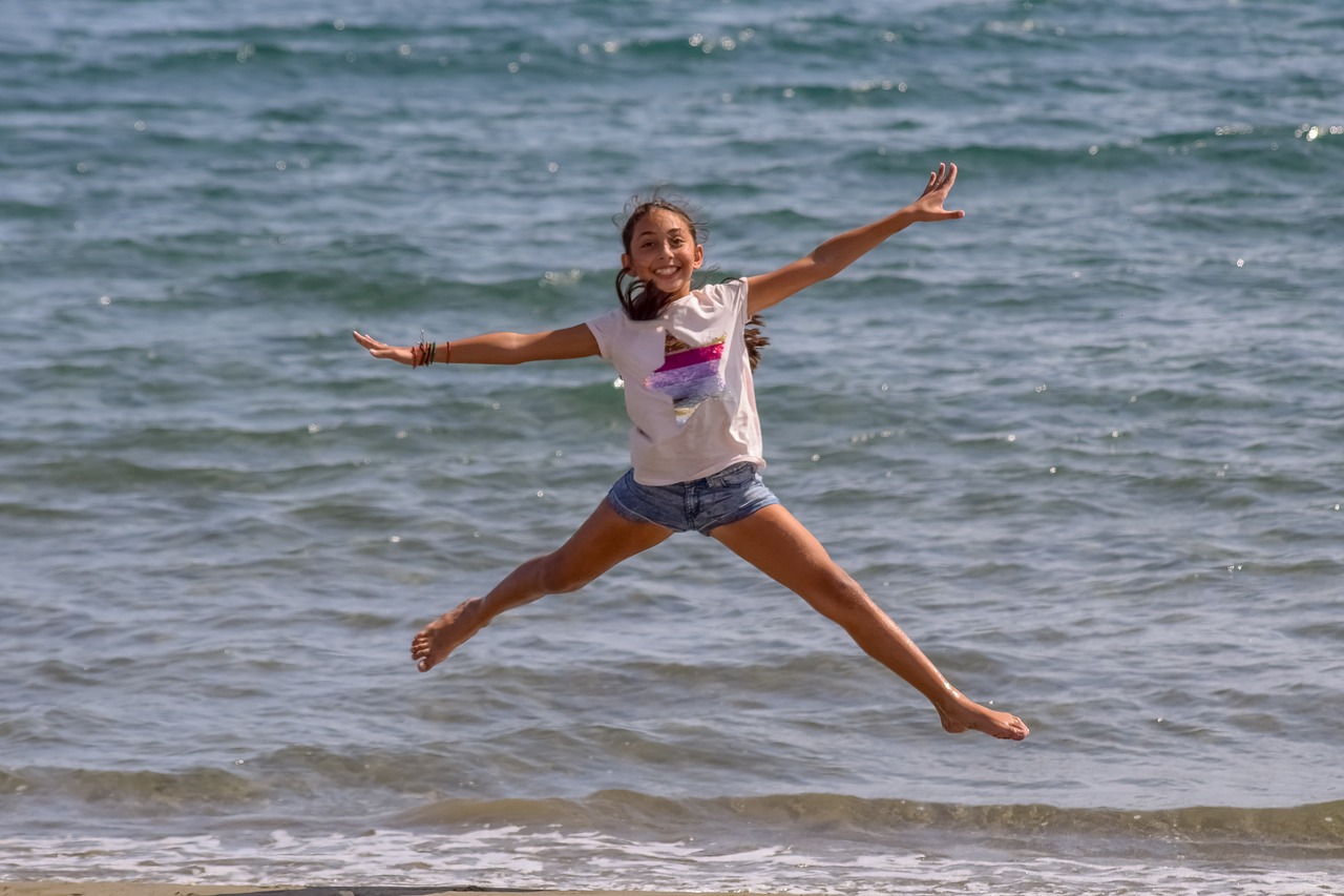 girl  jumping  outdoor free photo