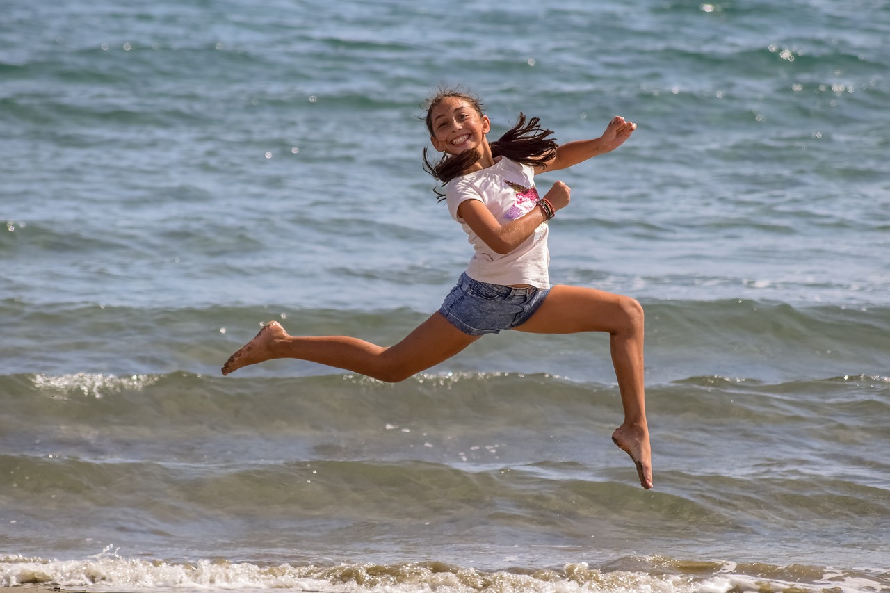 girl  jumping  outdoor free photo