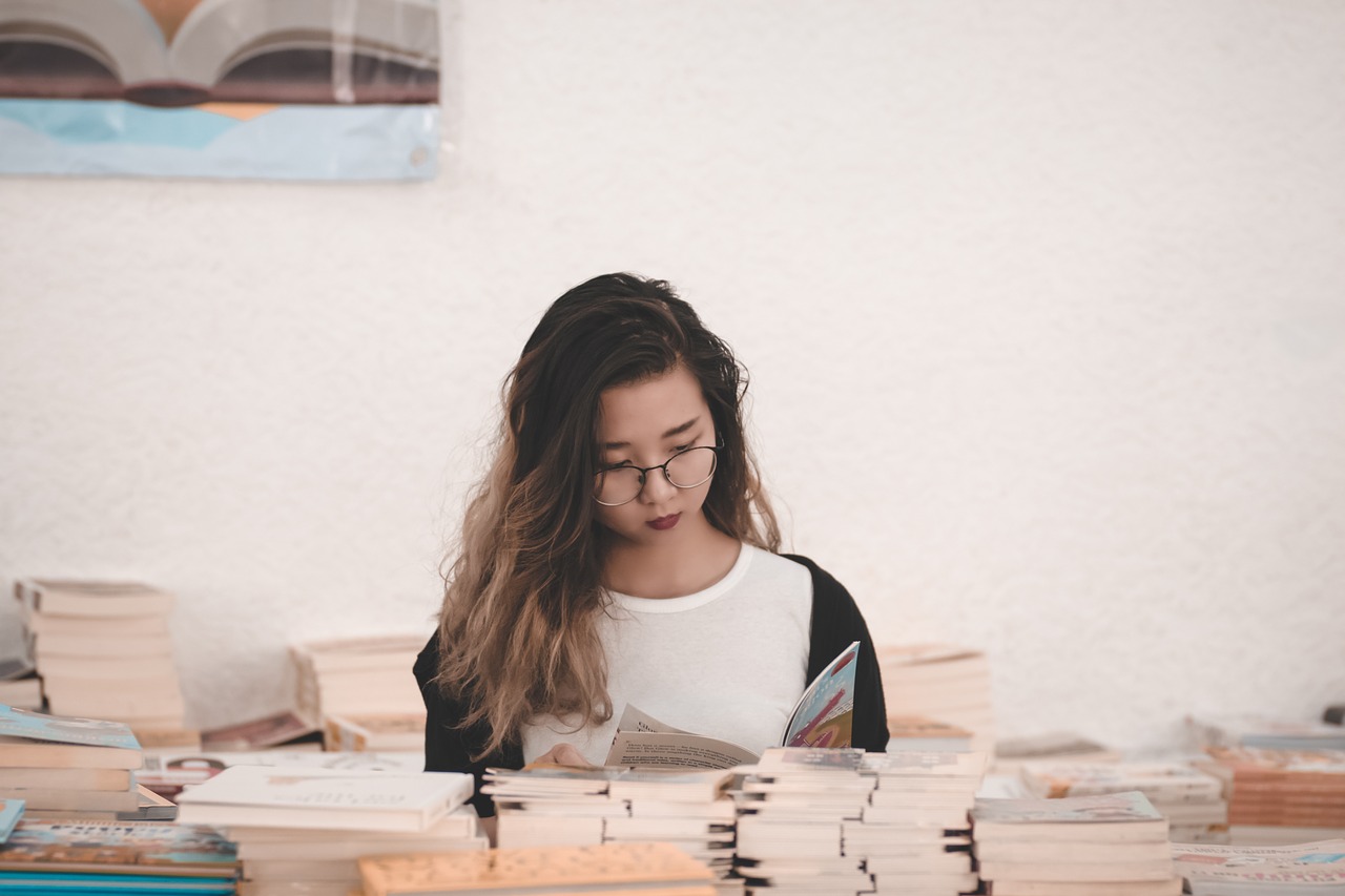 girl  coat black  books free photo