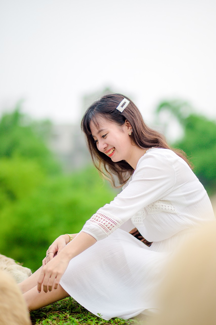 girl  sheep  girl sitting on meadow free photo