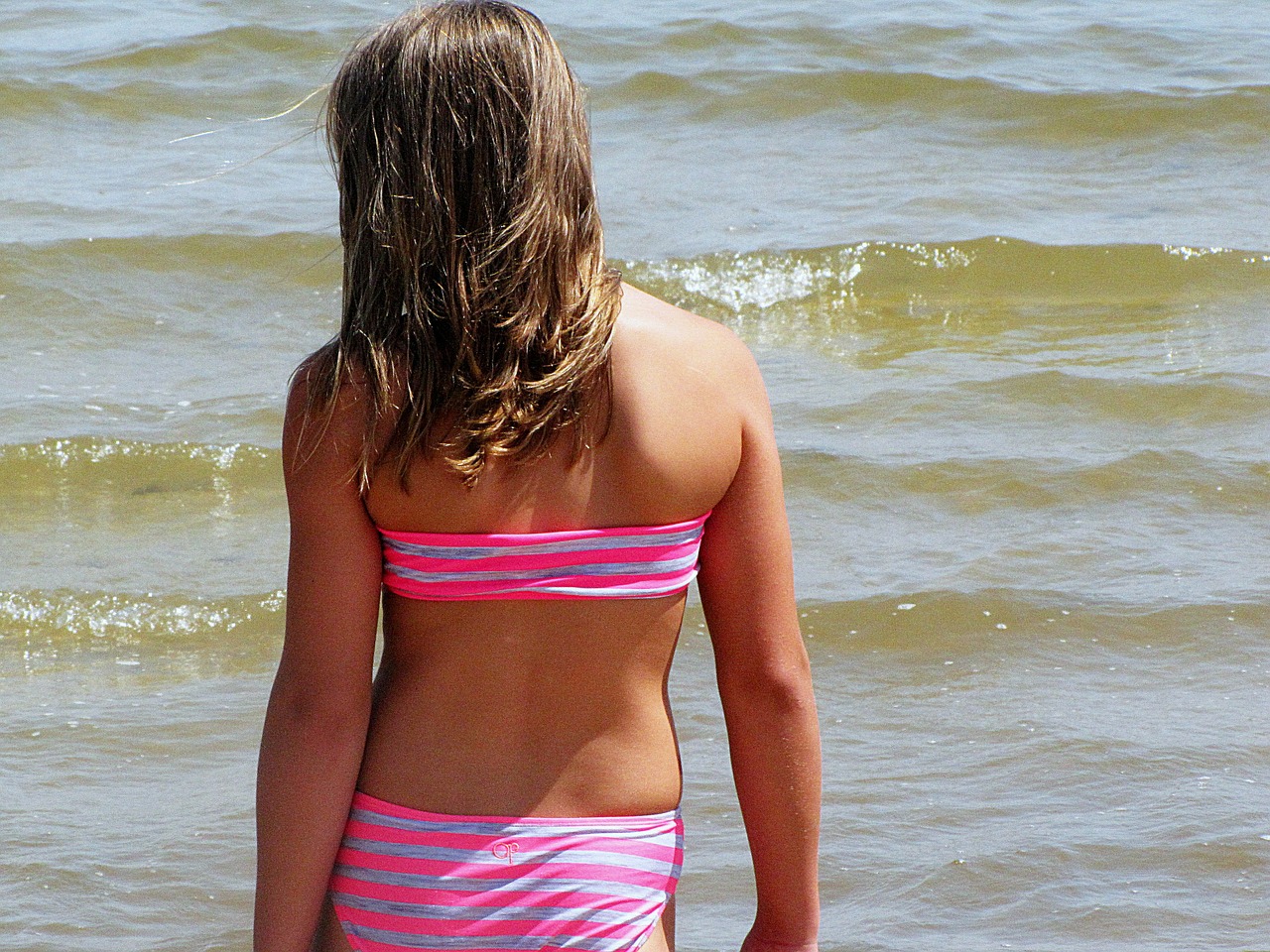 girl beach water free photo