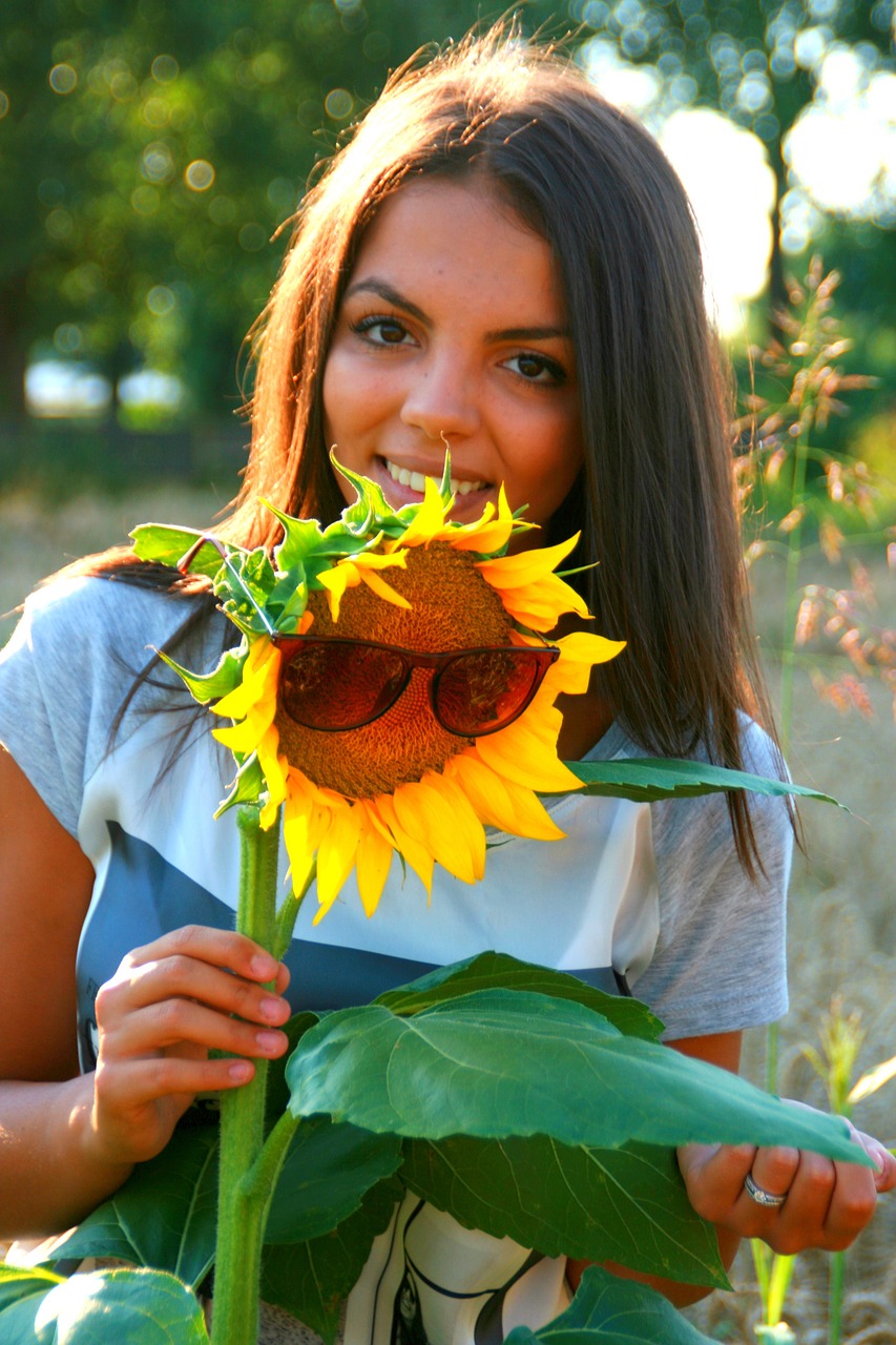 girl sunflower smile free photo