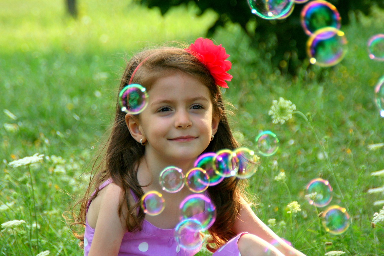 girl soap bubbles smile free photo