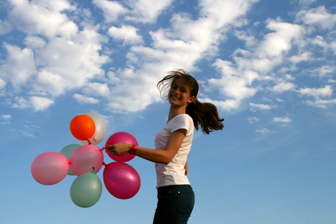 girl balloons bounce free photo