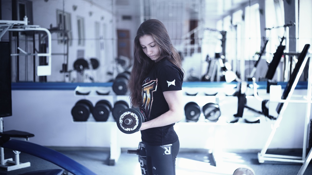 girl in the gym training apparatus kickboxing free photo