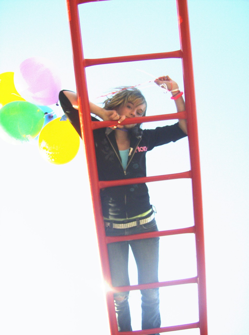 girl on ladder balloons ladder free photo