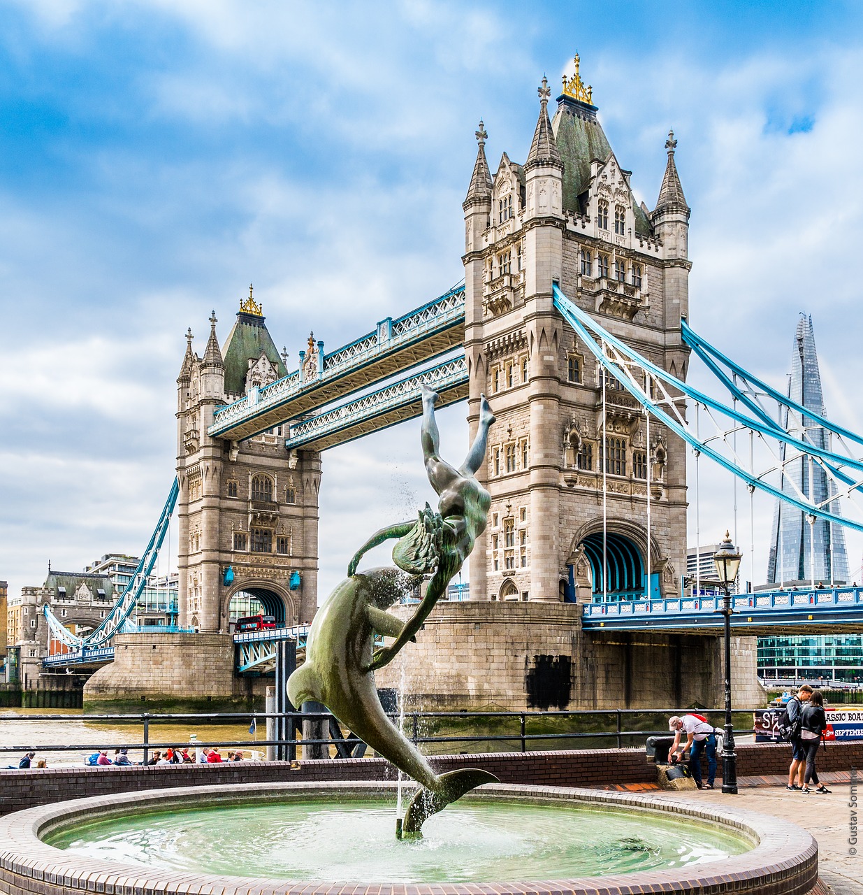 girl with a dolphin  tower bridge  london free photo