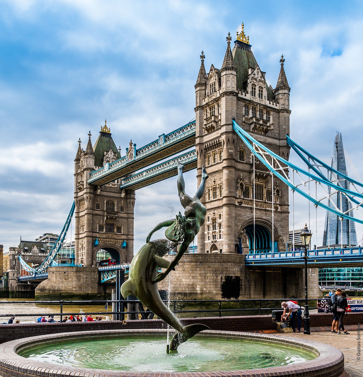 girl with a dolphin  tower bridge  london free photo