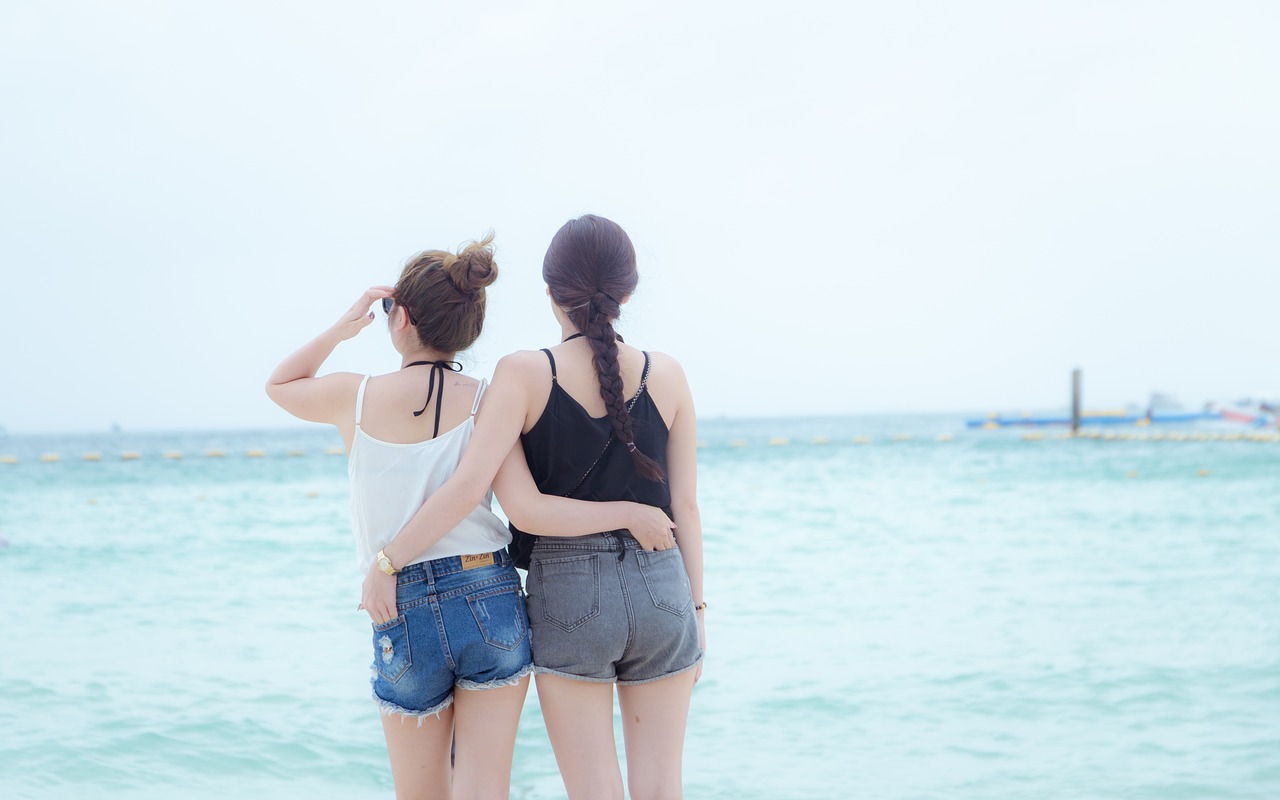 girls looking at the sea pattaya thailand free photo