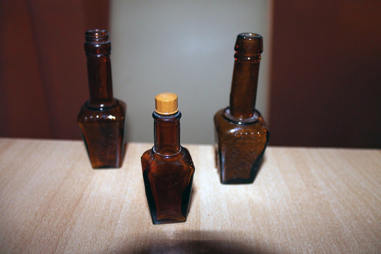 glass bottle bottles brown glass free photo
