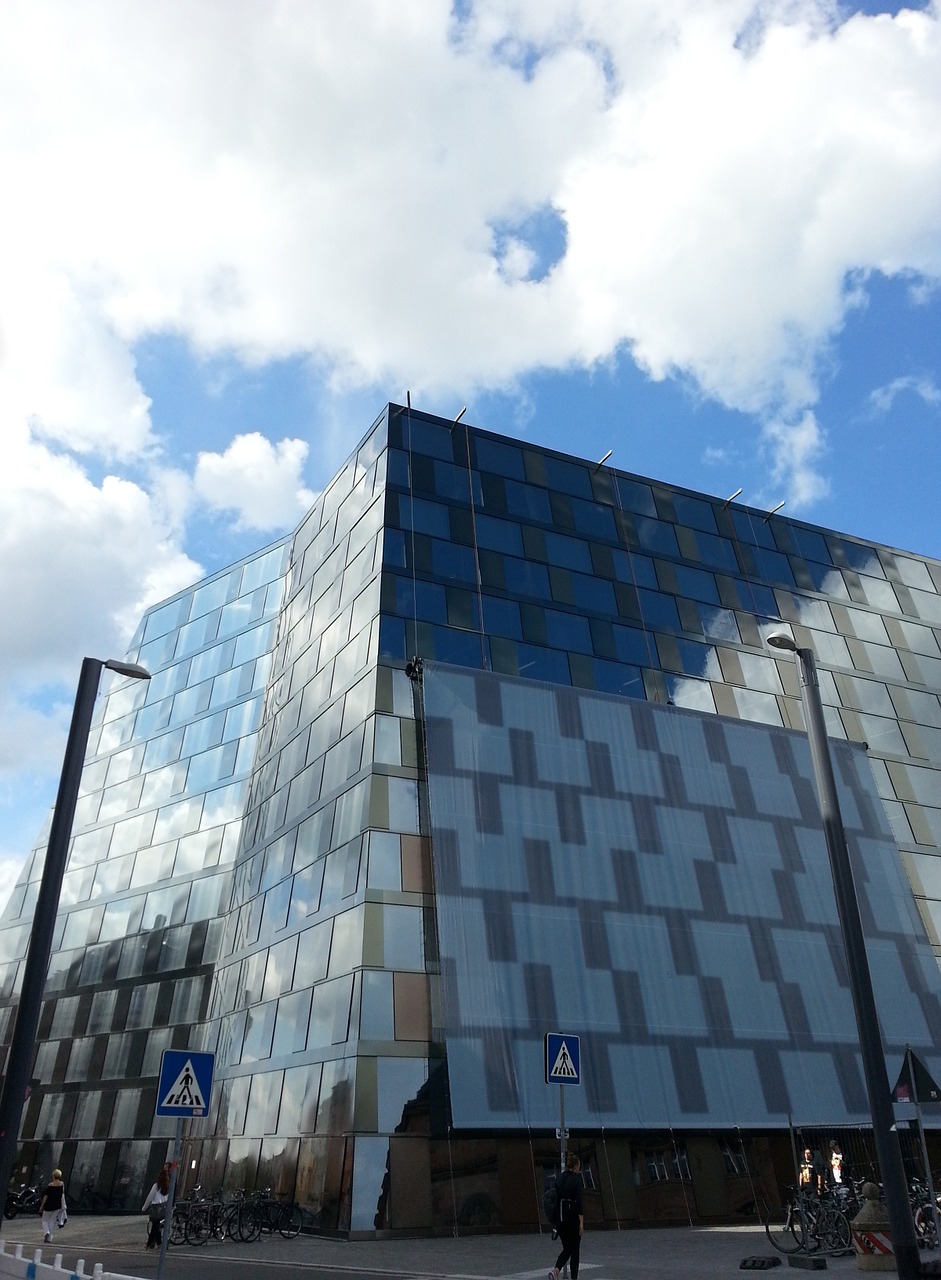 glass facade architecture mirroring free photo