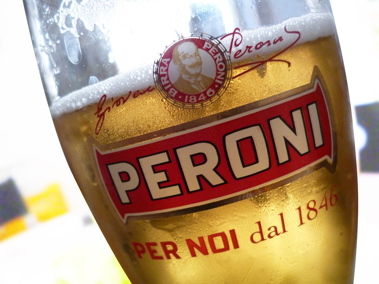 glass of beer italian trademark fresh drink free photo