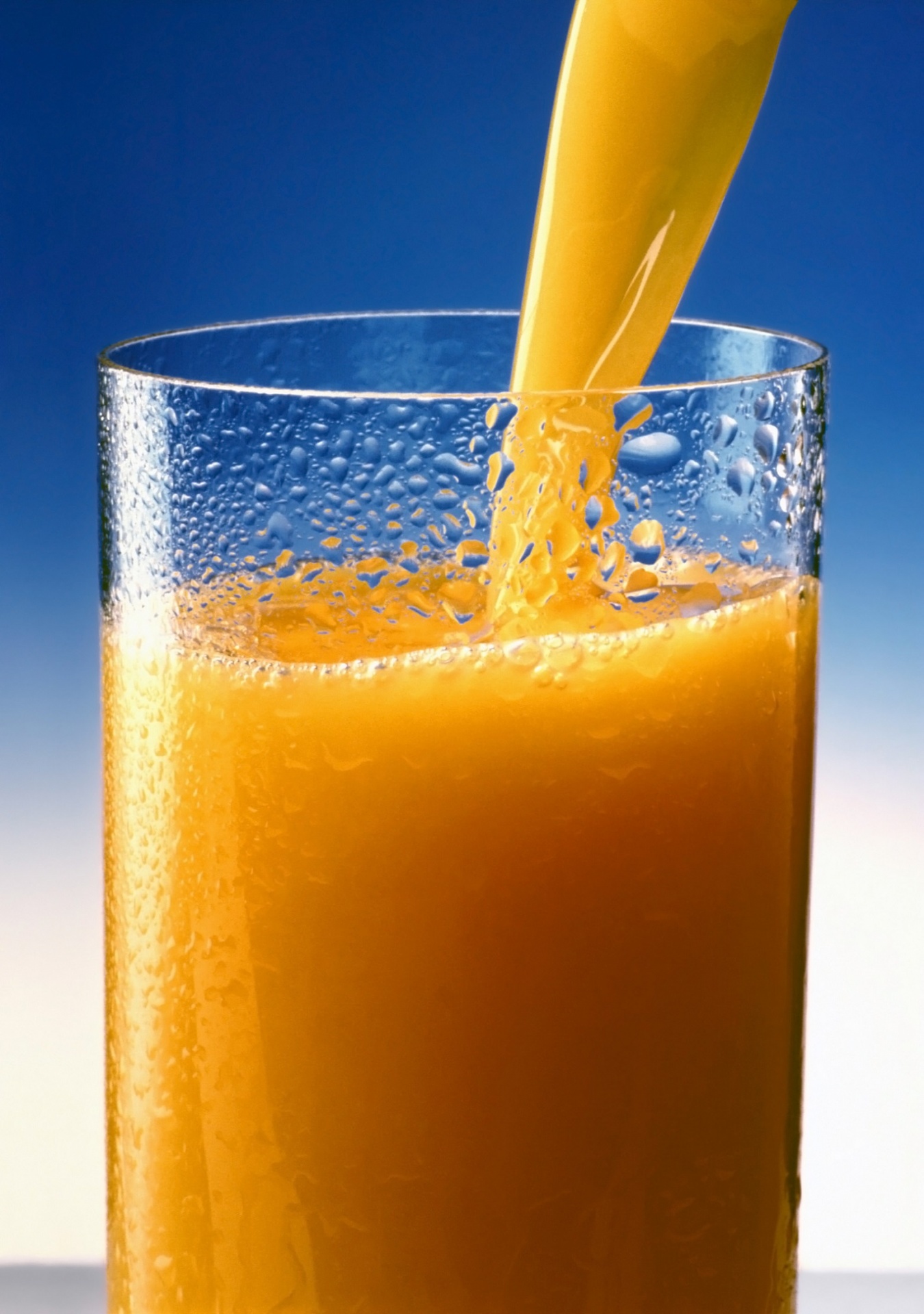 orange juice glass pour free photo