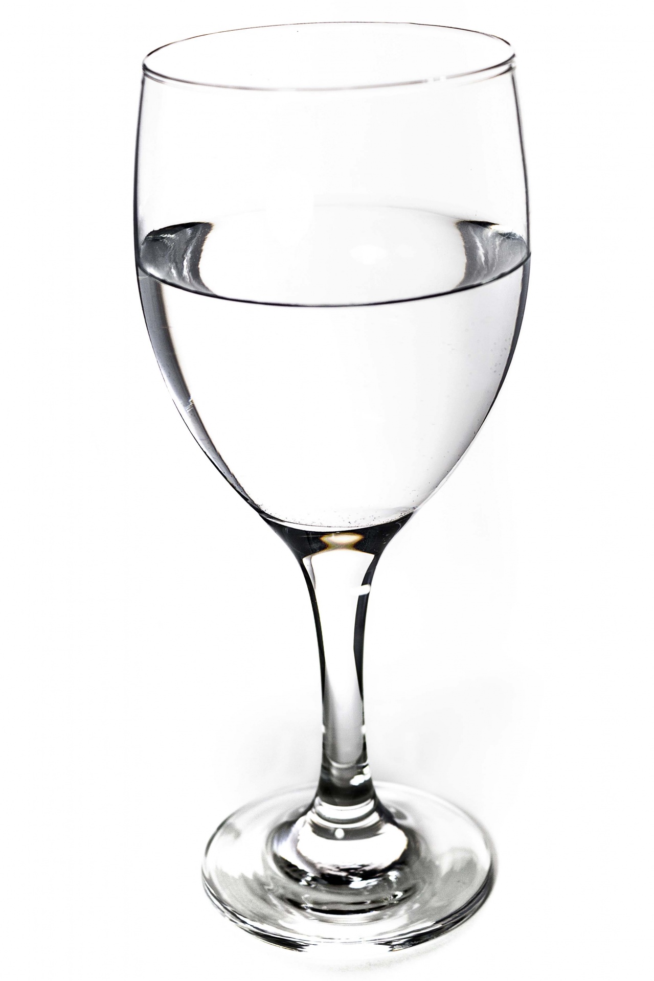 Clear Glass Of Water On A White Background Stock Photo - Download
