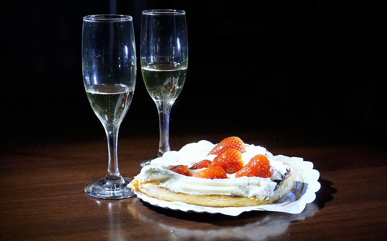 glasses of champagne cake celebration free photo