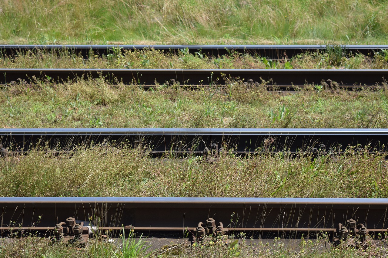 gleise railway tracks parallel free photo