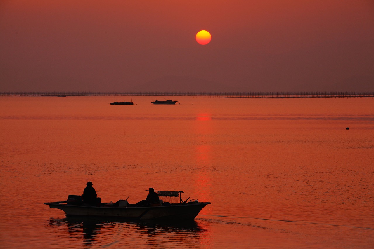 glow fisherman sea free photo