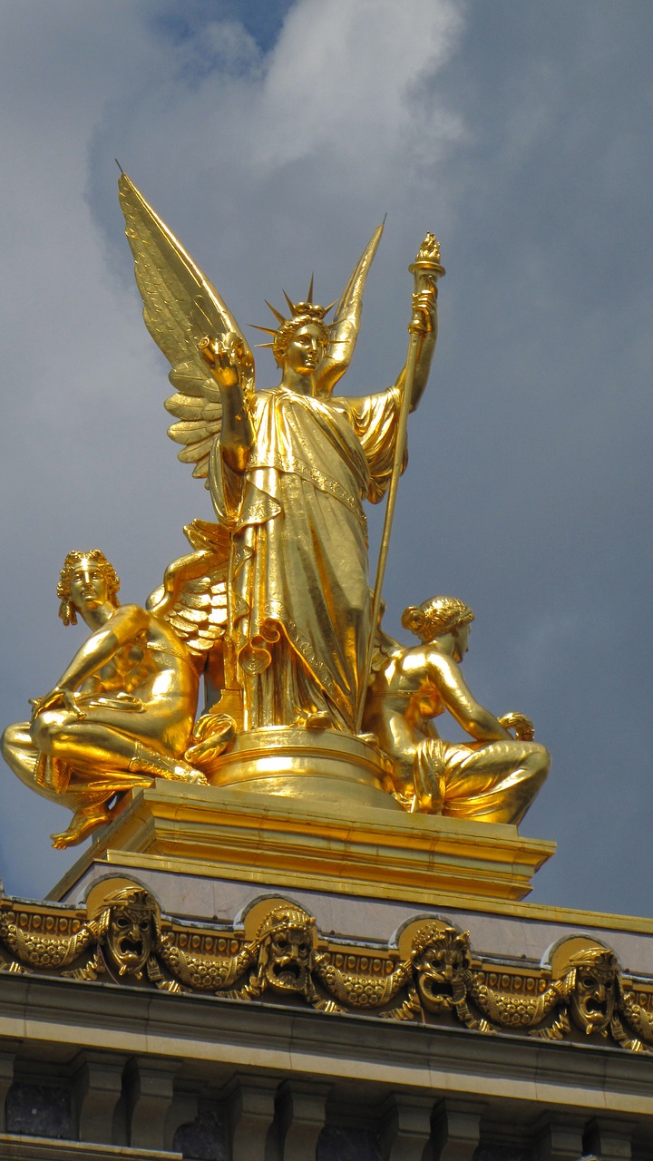 gold statue sculpture free photo