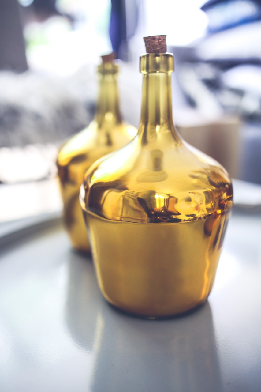 golden bottle glasses free photo