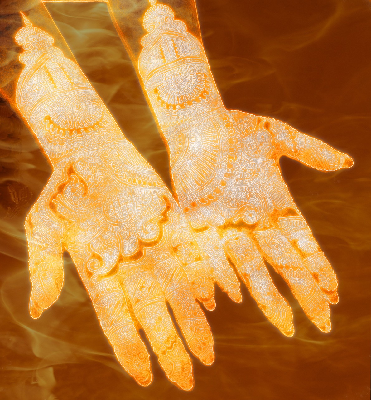 golden hand fire mehndi free photo