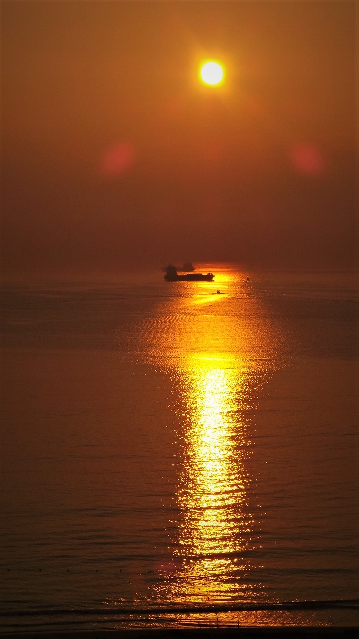 golden sea the shadow sunset free photo