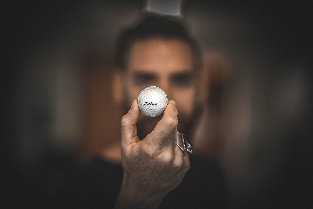 golf ball hand macro free photo