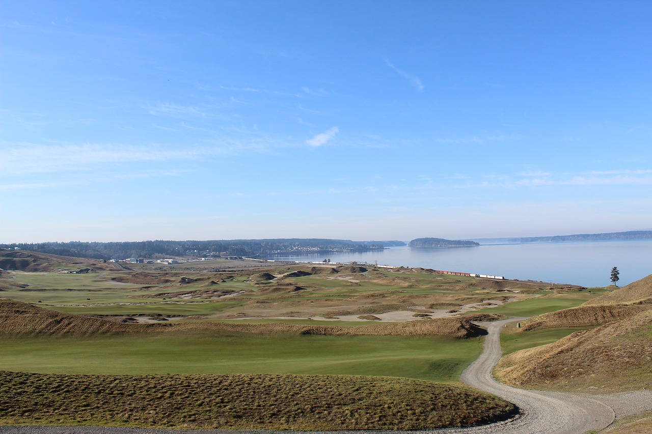 golf course  sea  scenic free photo