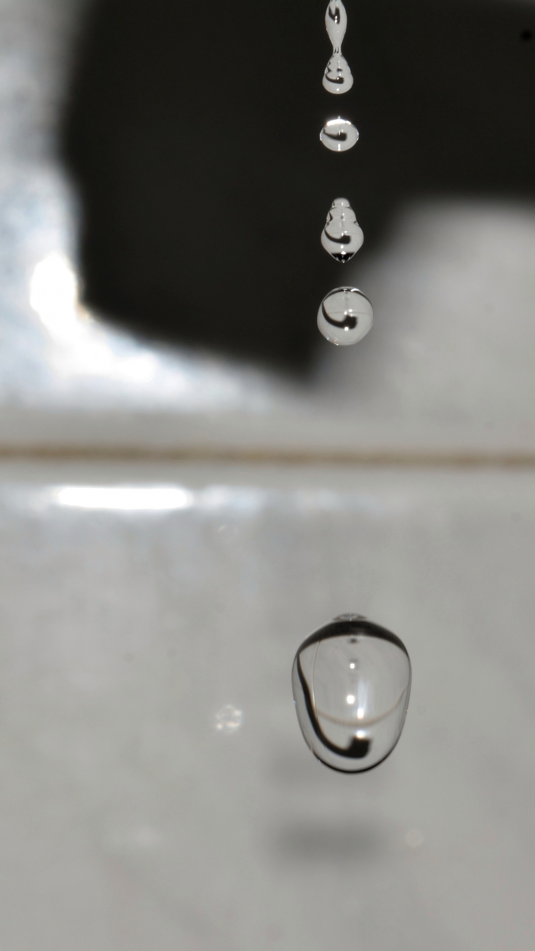 drop water drop of water falling from the tap free photo