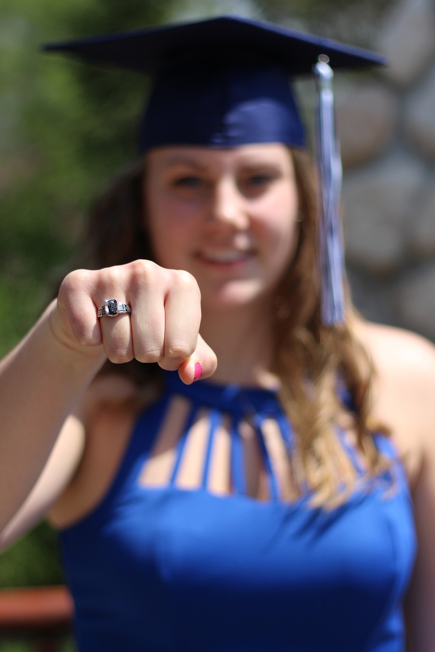graduate  class ring  outdoors free photo
