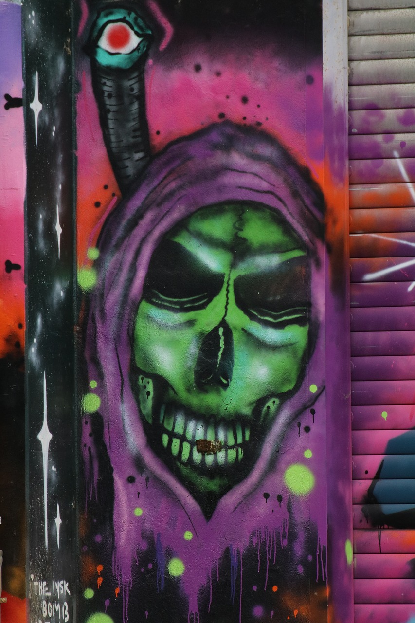 graffiti skull and crossbones purple free photo