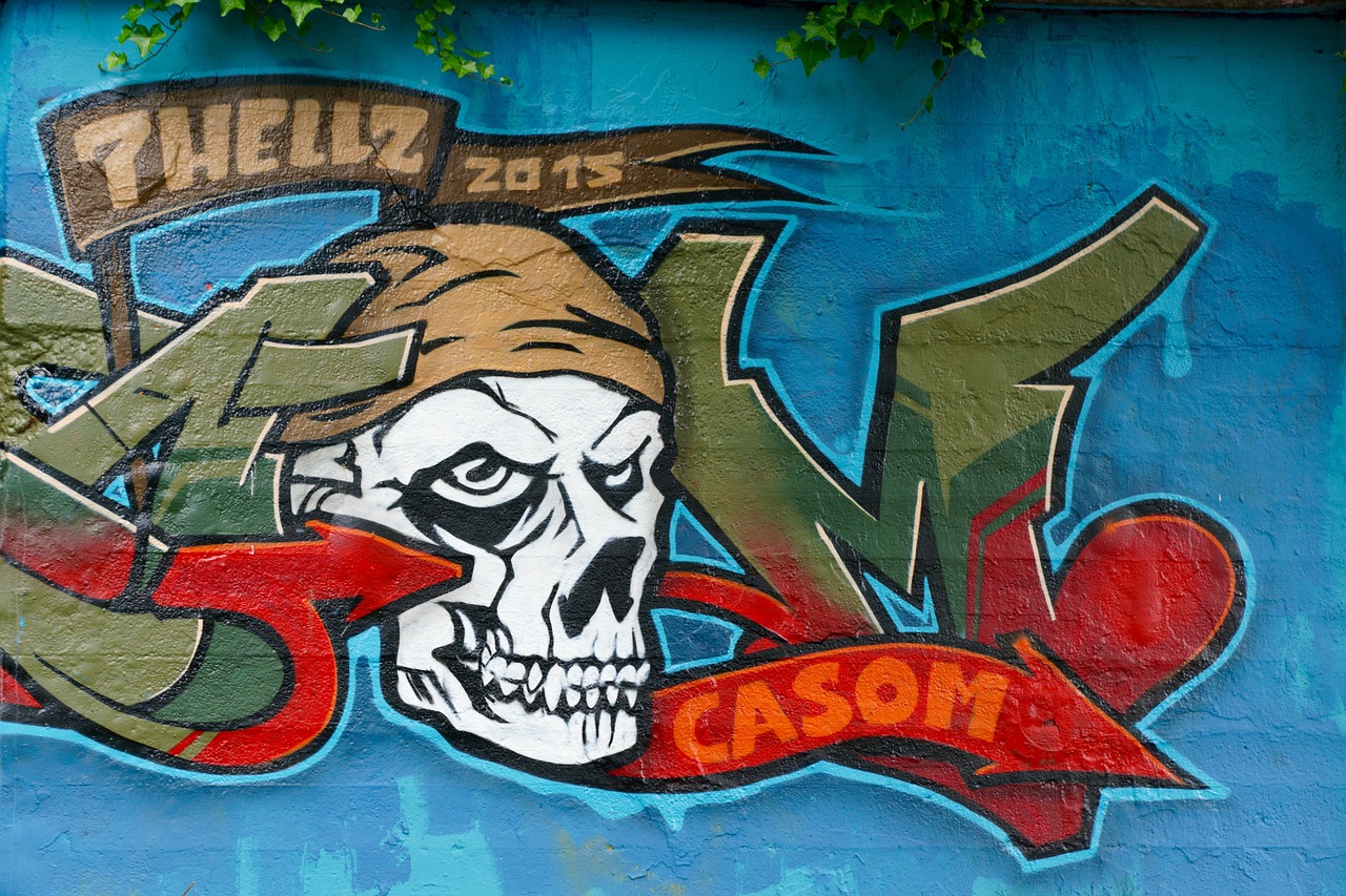 graffiti skull and crossbones wall free photo
