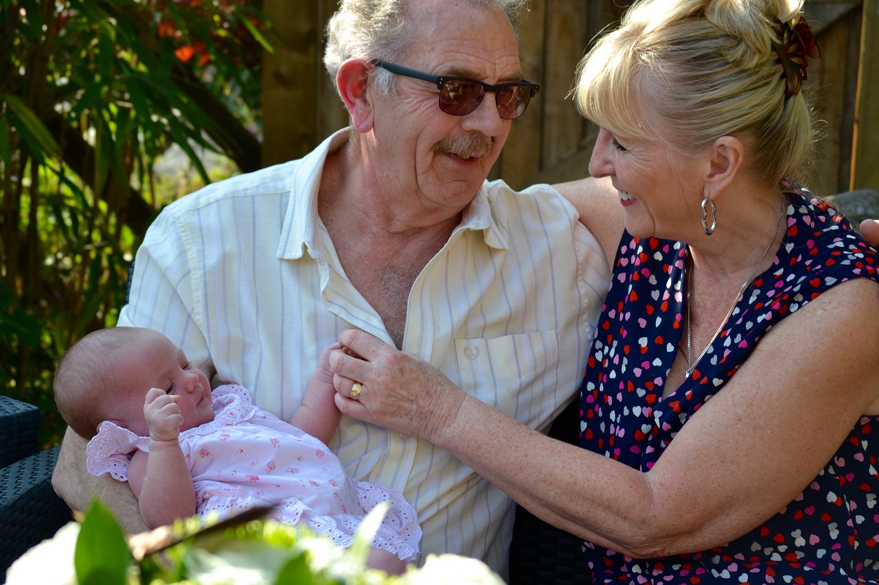 grandparents baby with grandparents generation free photo
