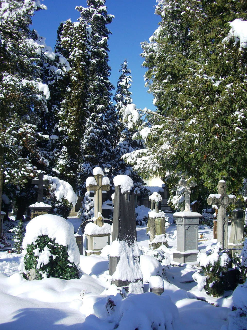 grave stones snow caps old cemetery free photo