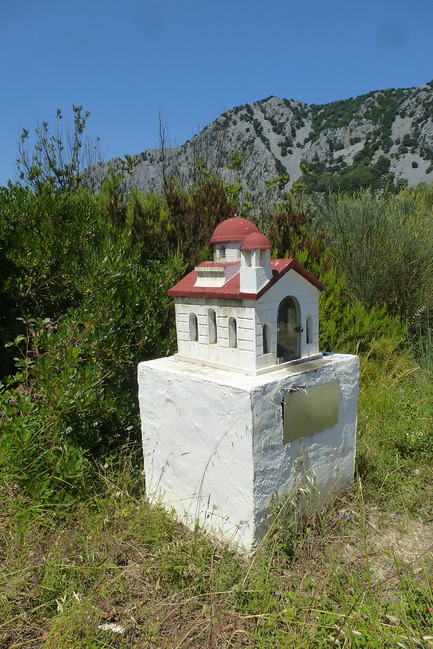 greece signpost church as a lane marker free photo