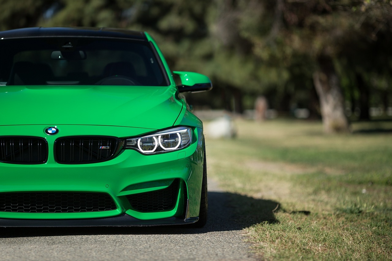 green car parked free photo