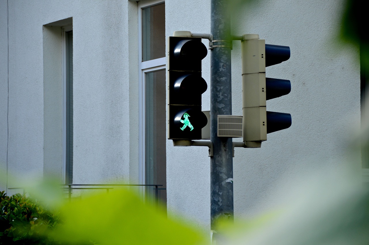 green traffic light traffic lights footbridge free photo