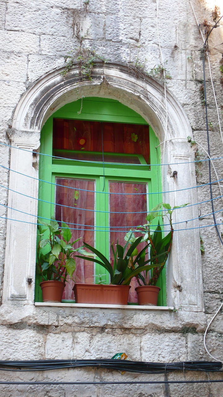 green window in split croatia free photo