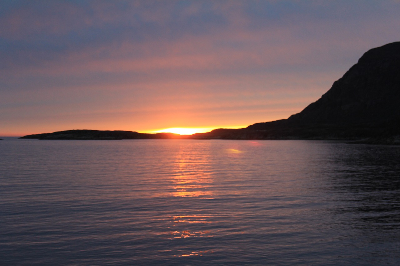 greenland sunset by the water free photo