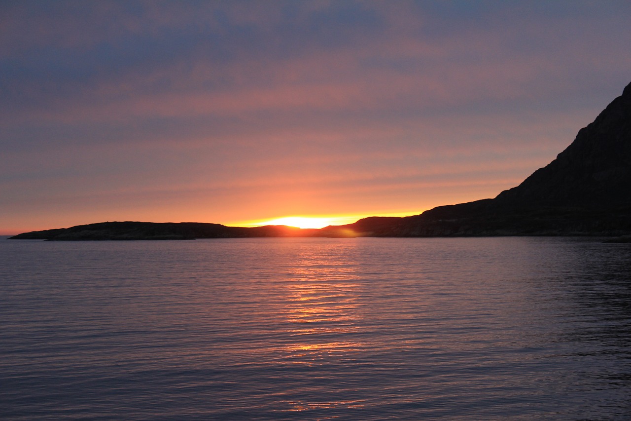 greenland sunset by the water free photo